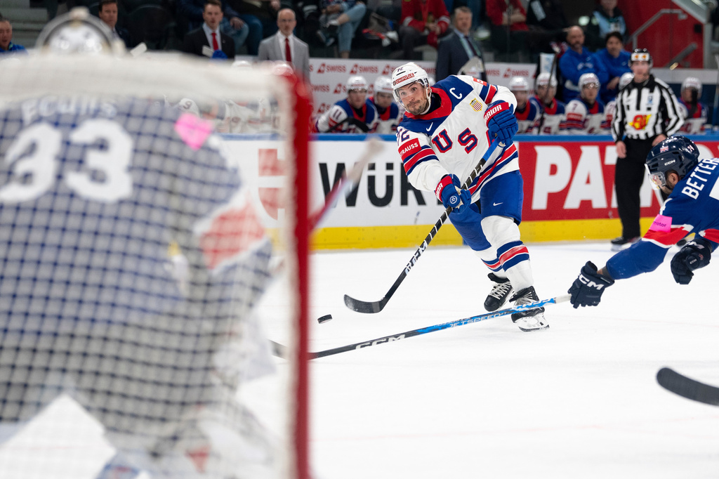 USA's Justin Faulk shoots the puck, during the 2026 IIHF Men's Ice Hockey World Championship preliminary round group A game between Britain and the United States, in Zurich, Switzerland, Sunday, May 17, 2026. (Claudio Thoma/Keystone via AP)