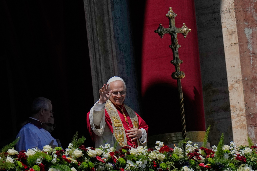 Pope Leo XIV addresses the faithful after delivering the Urbi et Orbi blessing - Latin for "to the city of Rome and to the world" - from the central loggia of St. Peter's Basilica at the end of Easter Mass he presided over in St. Peter's Square at the Vatican, Sunday, April 5, 2026. (AP Photo/Alessandra Tarantino)