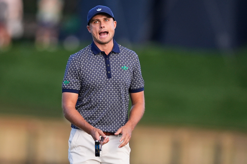 Ludvig Aberg of Sweden reacts after missing a putt on the 17th green during the third round of The Players Championship golf tournament Saturday, March 14, 2026, in Ponte Vedra Beach, Fla. (AP Photo/Gerald Herbert)