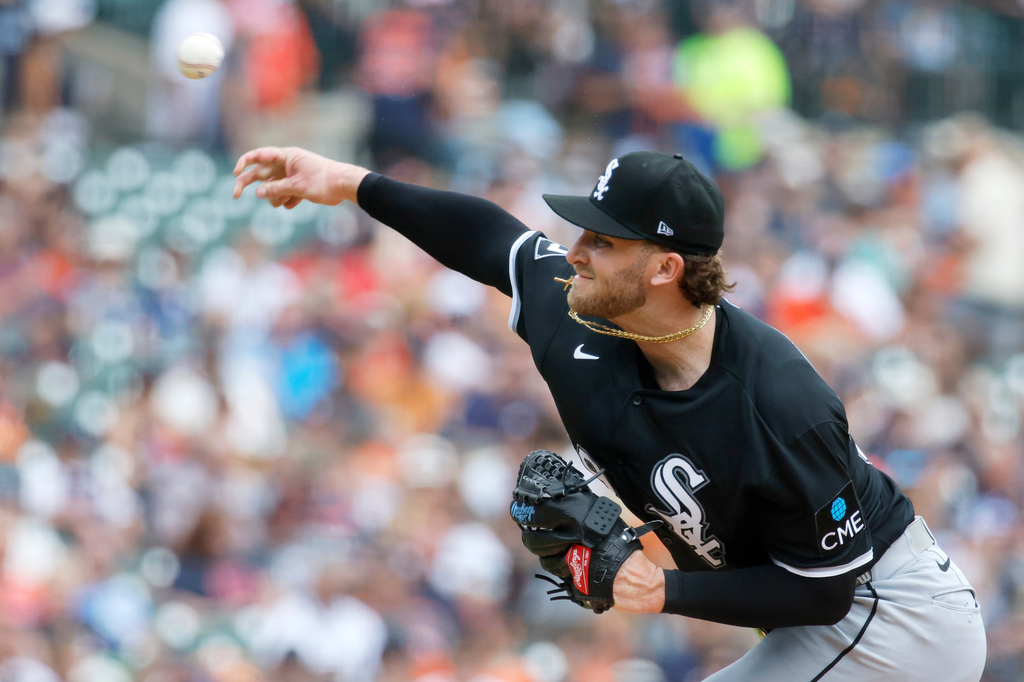 Chicago White Sox's Sean Burke pitches against the Detroit Tigers during the first inning of a baseball game Sunday, Aug. 16, 2026, in Detroit. (AP Photo/Duane Burleson)