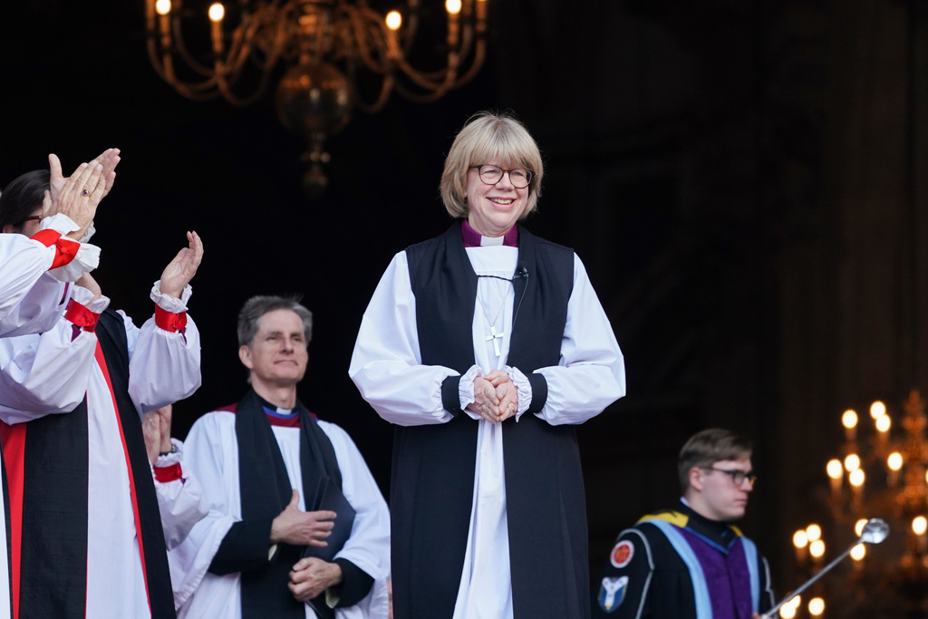 Sarah Mullally stands on the steps of St Paul's Cathedral, London, following the Confirmation of Election ceremony confirming her as archbishop of Canterbury, becoming the first woman to lead the Church of England, Wednesday Jan. 28 2026. (AP Photo/Alberto Pezzali)