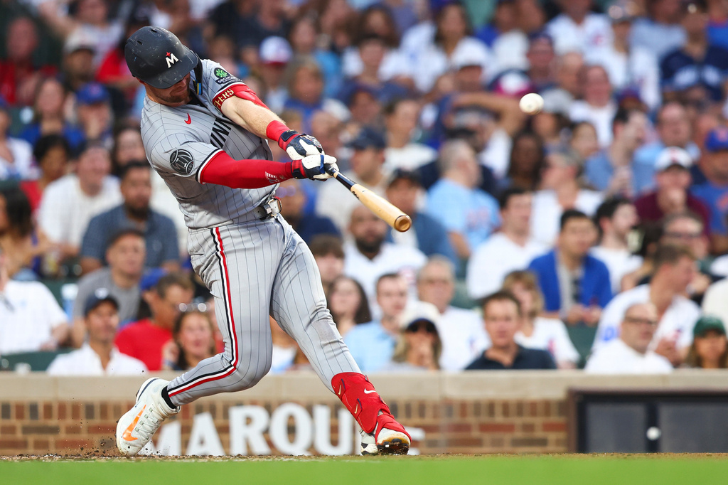 Minnesota Twins' Ryan Jeffers hits a home run during the third inning of a baseball game against the Chicago Cubs in Chicago, Friday, July 17, 2026. (AP Photo/Jessie Alcheh)