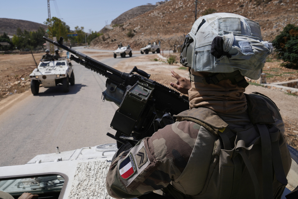 French U.N. peacekeepers patrol at the Suluki Valley, south Lebanon, Wednesday, Aug. 20, 2025. (AP Photo/Hussein Malla)