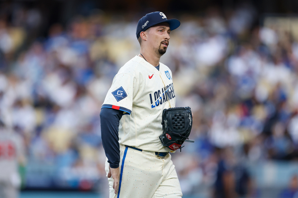 Los Angeles Dodgers starting pitcher Blake Snell (7) walks back to the dugout at the end of the top of the first inning of a baseball game against the Atlanta Braves, Saturday, May 9, 2026, in Los Angeles. (AP Photo/Caroline Brehman)