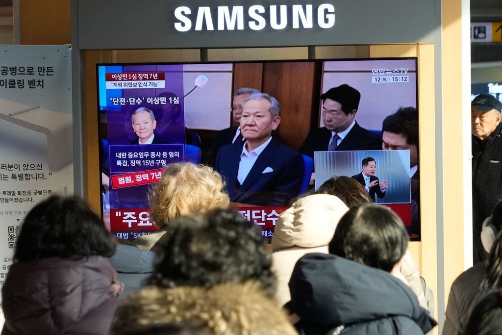A TV screen shows footage of South Korean former Interior and Safety Minister Lee Sang-min during a news program at the Seoul Railway Station in Seoul, South Korea, Thursday, Feb. 12, 2026. (AP Photo/Ahn Young-joon)