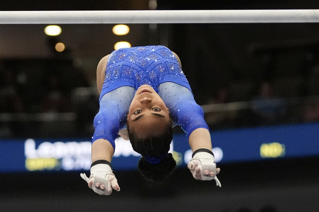 Hezly Rivera of WOGA competes on the uneven bars during the senior women's finals of the U.S. Gymnastics Championships in New Orleans, Sunday, Aug. 10, 2025. (AP Photo/Gerald Herbert)