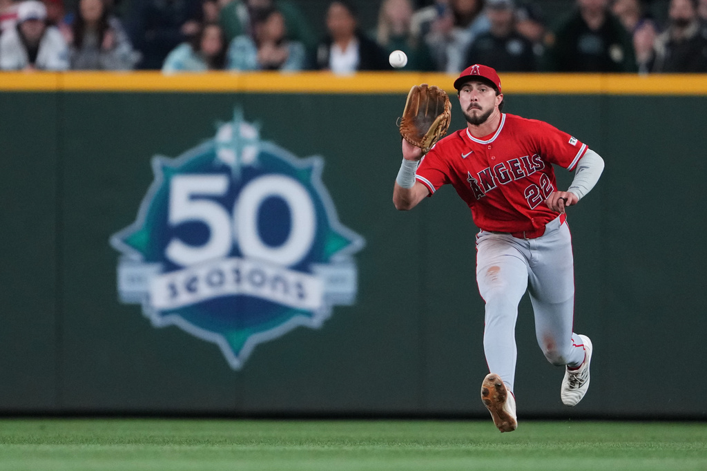 Los Angeles Angels center fielder Bryce Teodosio catches a fly ball off the bat of Seattle Mariners' Josh Naylor for an out during the eighth inning of a baseball game, Thursday, Sept. 24, 2026, in Seattle. (AP Photo/Lindsey Wasson)