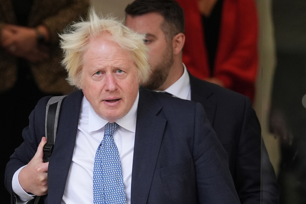 Former prime minister Boris Johnson leaves Dorland House in London after giving evidence for module 8 (children and young people) in the UK Covid-19 Inquiry, on Tuesday Oct. 21, 2025. (Lucy North/PA via AP)