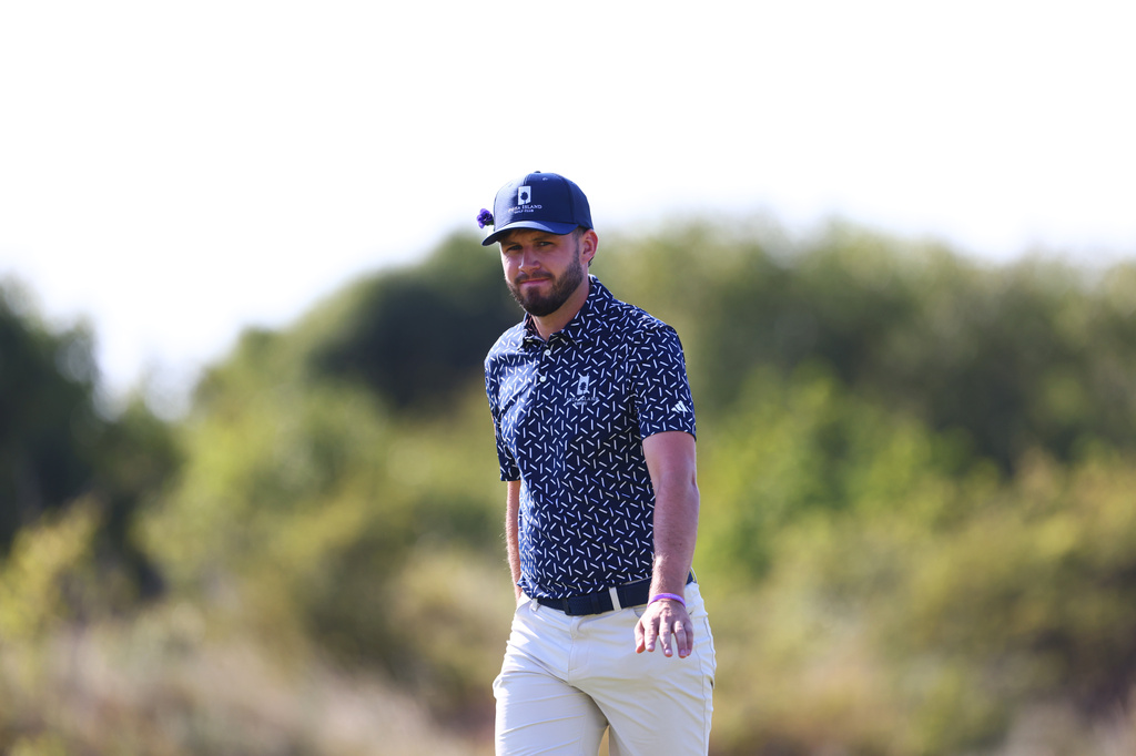 Ireland's David Howard lines on the 16th green during a practice round at the British Open Golf Championship at Royal Birkdale, Southport, England, Monday, July 13, 2026. (AP Photo/Peter Morrison)