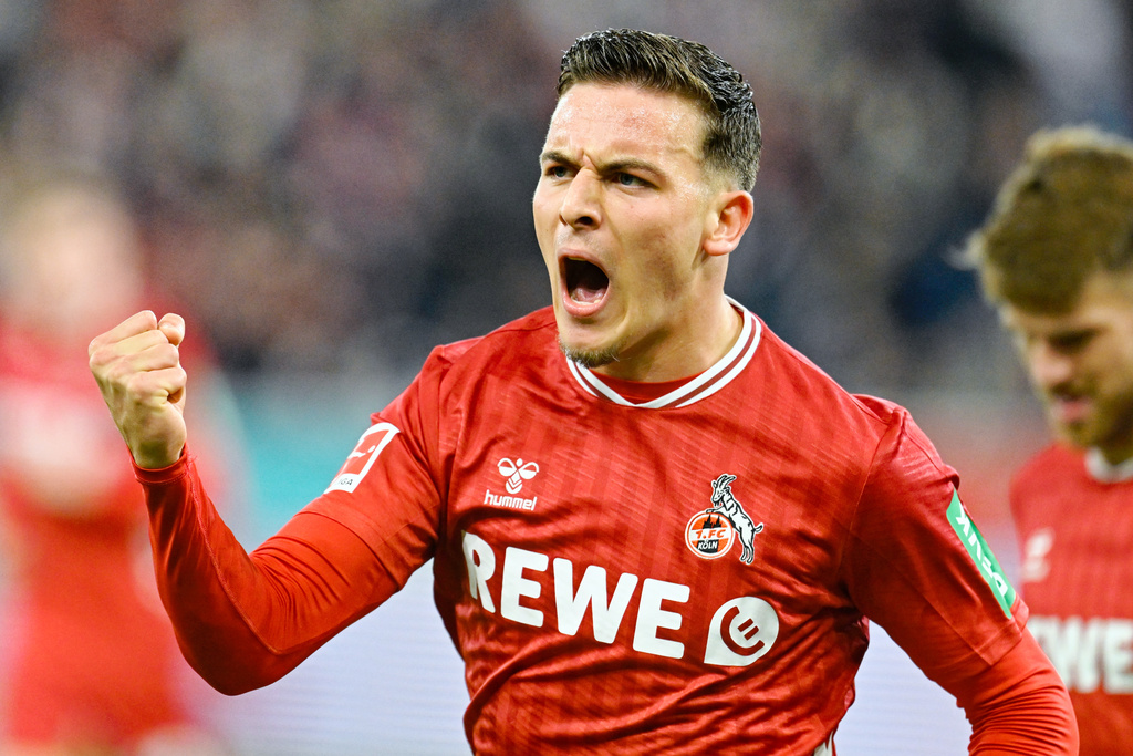 Koln's Said El Mala celebrates after scoring during the Bundesliga soccer match between Hoffenheim and Koln, at the PreZero Arena in Sinsheim, Germany, Friday Oct. 3, 2025. (Uwe Anspach/dpa via AP)