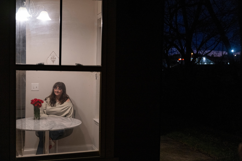 Kate poses for a portrait in her apartment in Kentucky, Wednesday, Dec. 10, 2025. (AP Photo/Michael Swensen)