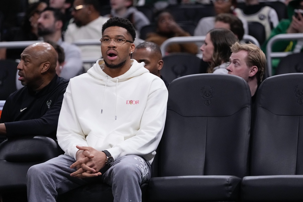 Milwaukee Bucks' Giannis Antetokounmpo sits on the bench during the first half of an NBA basketball game Wednesday, Feb. 4, 2026, in Milwaukee. (AP Photo/Morry Gash)