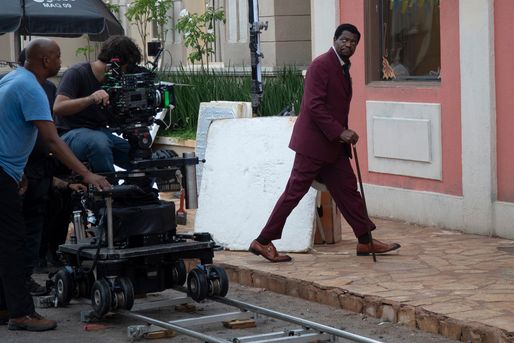 Actor Bukassa Kabengele, right, takes part in the filming of the soap opera "A Nobreza do Amor" at a TV Globo set in Rio de Janeiro, Thursday, March 12, 2026. (AP Photo/Bruna Prado)
