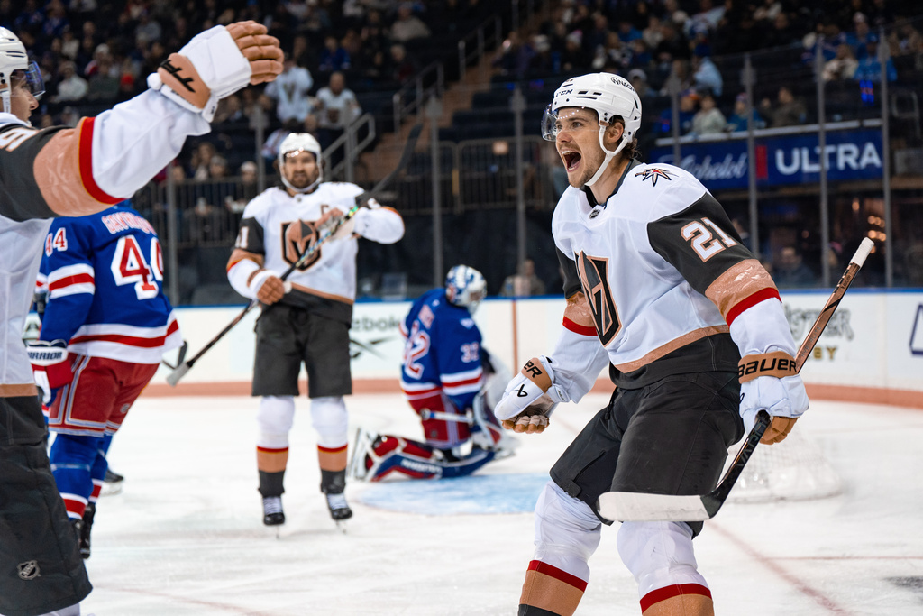 Vegas Golden Knights center Brett Howden (21) celebrates an early-period goal against the New York Rangers during the first period of an NHL hockey game, Sunday, Dec. 7, 2025, in New York. (AP Photo/Angelina Katsanis)