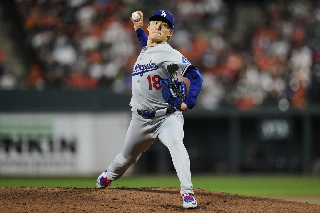 Los Angeles Dodgers starting pitcher Yoshinobu Yamamoto delivers during the first inning of a baseball game against the Baltimore Orioles, Saturday, Sept. 6, 2025, in Baltimore. (AP Photo/Stephanie Scarbrough)