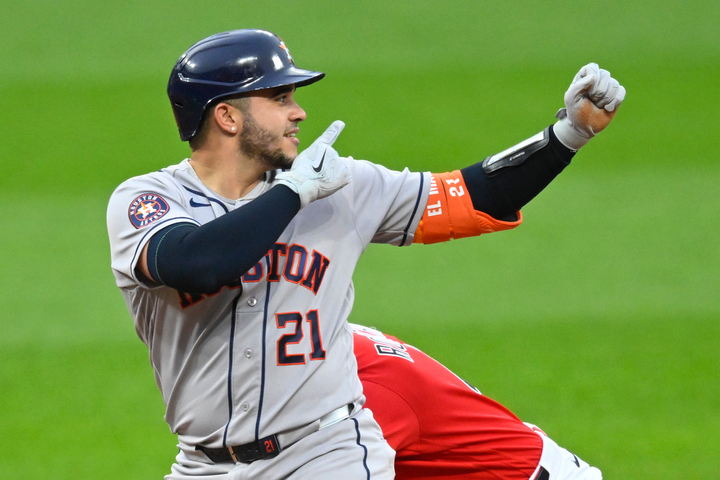 Houston Astros' Yainer Diaz celebrates his double in the fifth inning of a baseball game against the Cleveland Guardians in Cleveland, Tuesday, April 21, 2026. (AP Photo/David Richard)