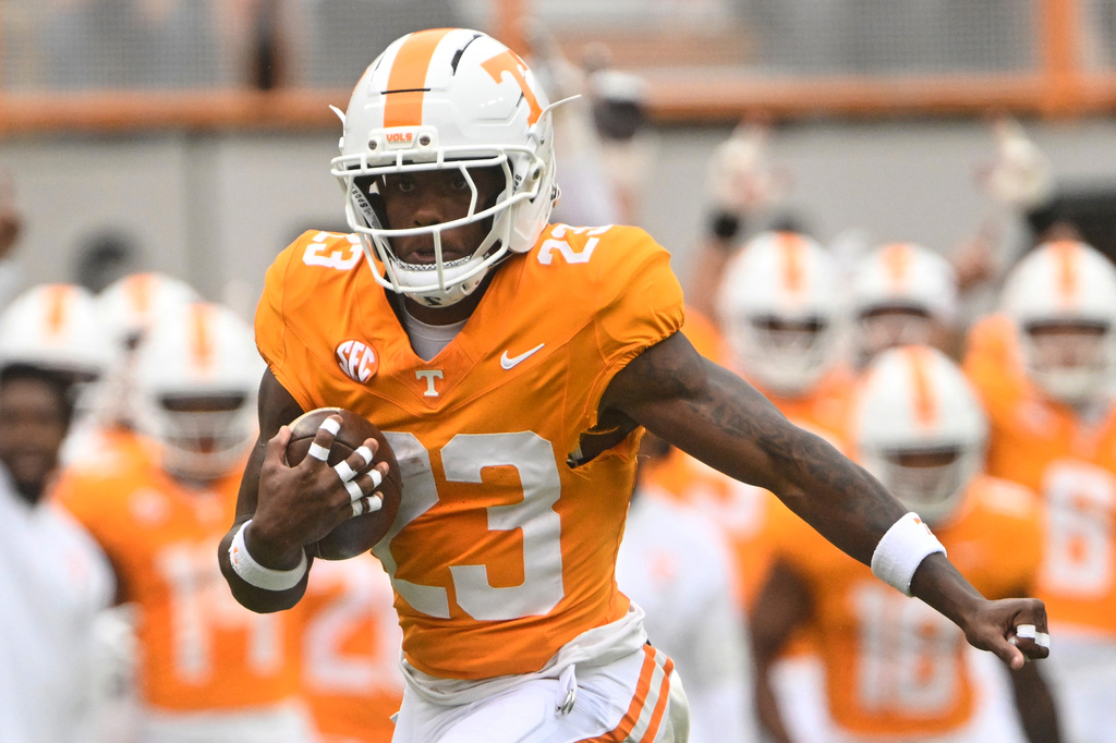 FILE - Tennessee's Boo Carter (23), who has since transferred to Colorado, runs with the ball during an NCAA football game against ETSU, Saturday, Sept. 6, 2025, in Knoxville, Tenn. (AP Photo/John Amis, File)
