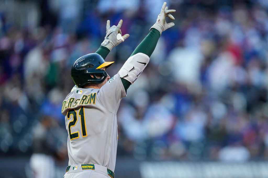 Athletics' Tyler Soderstrom (21) reacts after hitting a three-run home run in the eighth inning of a baseball game against the New York Mets, Saturday, April 11, 2026, in New York. (AP Photo/Yuki Iwamura)