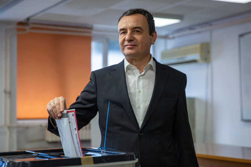 Kosovo's acting prime minister and leader of VeteVendosje political party Albin Kurti casts his ballot in Kosovo's capital Pristina, Sunday Dec. 28, 2025. (AP Photo/Visar Kryeziu)