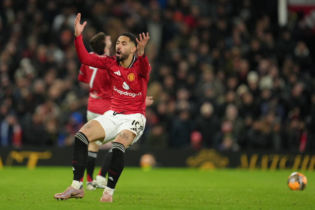 Manchester United's Matheus Cunha reacts during the FA Cup third round soccer match between Manchester United and Brighton in Manchester, England, Sunday, Jan. 11, 2026. (AP Photo/Jon Super)
