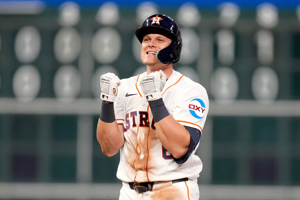 Houston Astros' Jake Meyers reacts after hitting a two-run double against the Los Angeles Angels during the sixth inning of a baseball game Saturday, March 28, 2026, in Houston. (AP Photo/Eric Christian Smith)