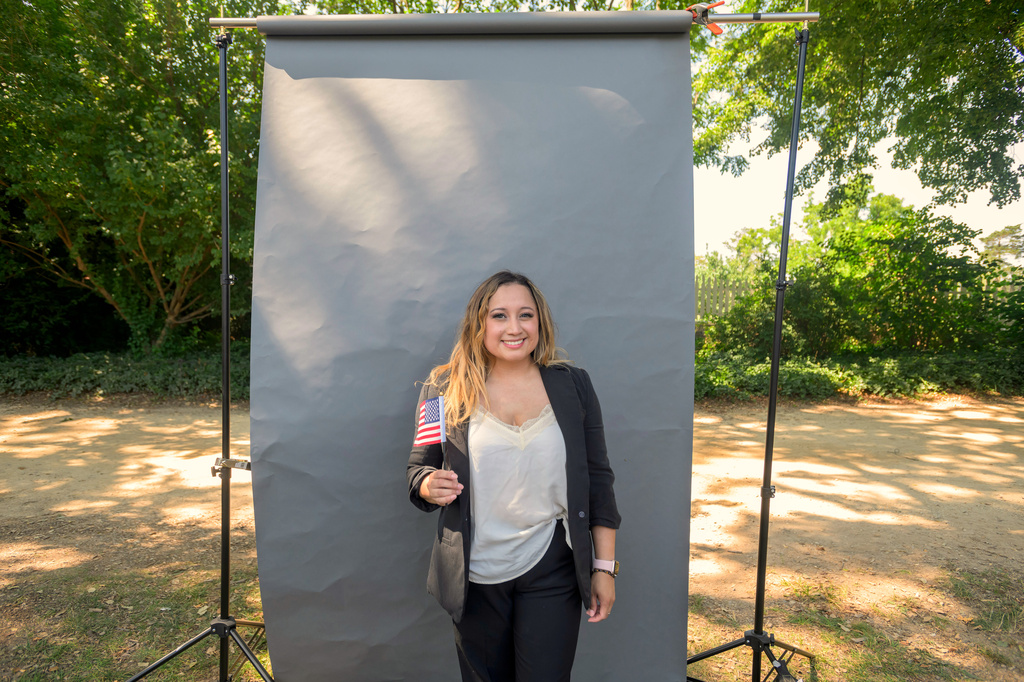 New U.S. citizen Yosselin May, from Honduras, poses for a portrait following a naturalization ceremony on Independence Day at George Washington's Mount Vernon, Saturday, July 4, 2026, in Alexandria, Va. (AP Photo/Rod Lamkey, Jr.)