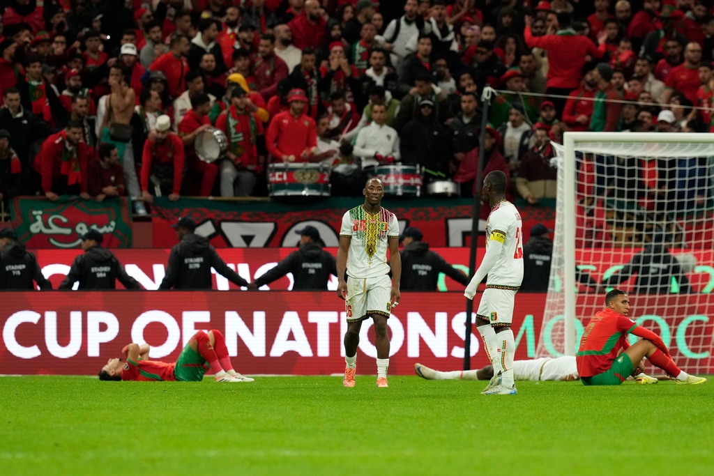 Players react following the African Cup of Nations Group A soccer match between Morocco and Mali in Rabat, Morocco, Friday, Dec. 26, 2025. (AP Photo/Mosa'ab Elshamy)