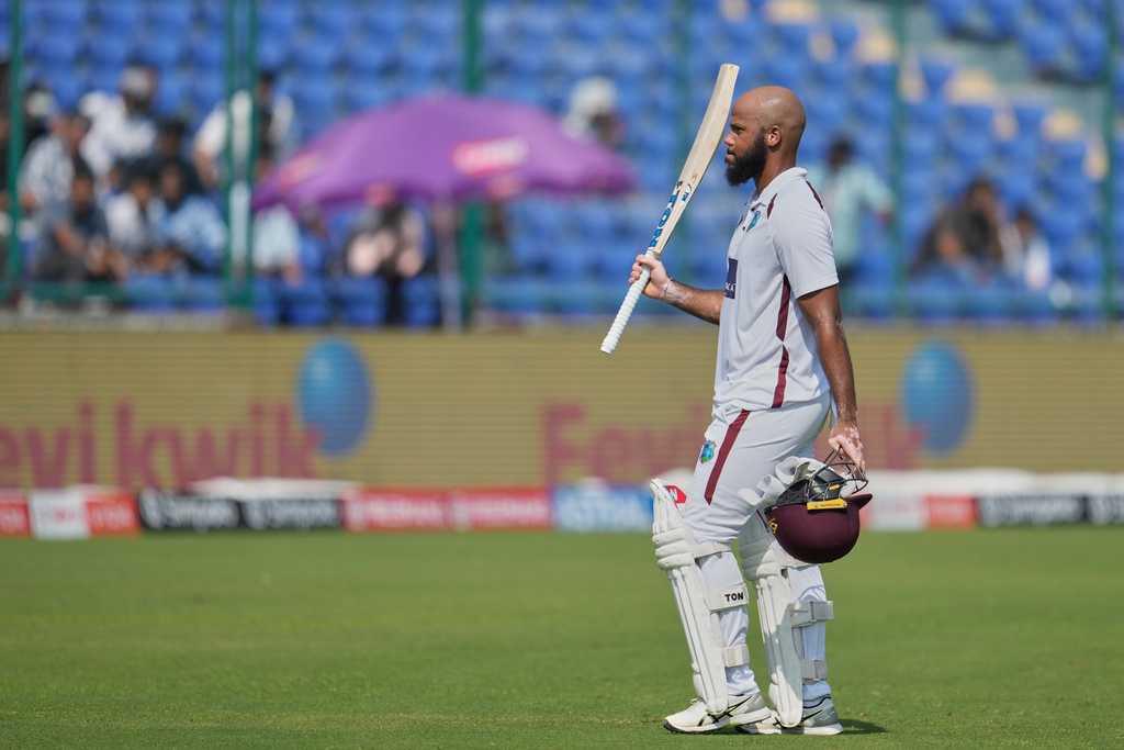 West Indies' John Campbell walks off the field after losing his wicket on the fourth day of the second cricket test match between India and West Indies at the Arun Jaitley Stadium in New Delhi, India, Monday, Oct.13, 2025. (AP Photo/Manish Swarup)