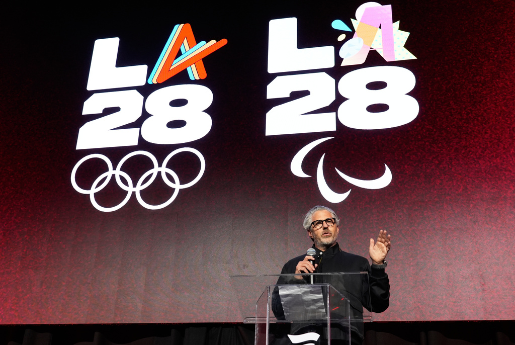 FILE - Casey Wasserman, chairman of the 2028 Los Angeles Olympics organizing committee, speaks at the launch party for Fanatics Studio, a global studio for sports entertainment, Jan. 13, 2026, at the Intuit Dome in Inglewood, Calif. (AP Photo/Chris Pizzello, File)