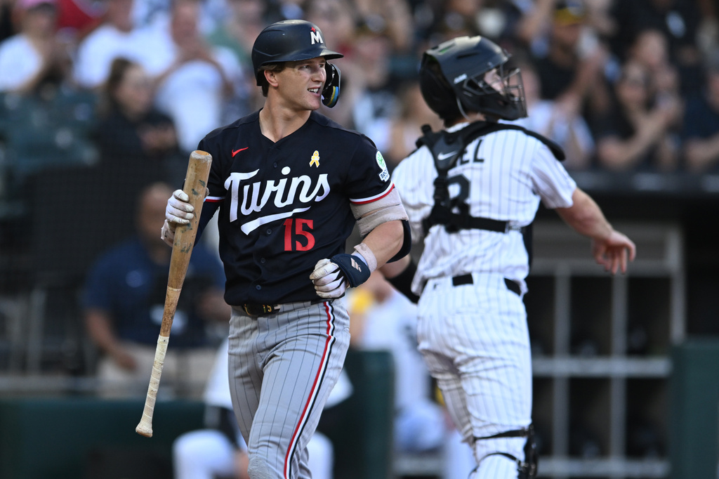 Minnesota Twins' Luke Keaschall (15) reacts after striking out during the first inning of a baseball game against the Chicago White Sox, Sunday, Sept. 6, 2026, in Chicago. (AP Photo/Paul Beaty)