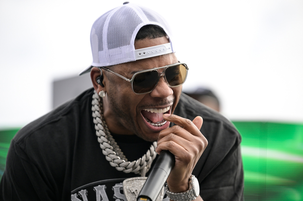 FILE - Rapper Nelly performs prior to a NASCAR Cup Series auto race at Charlotte Motor Speedway, Sunday, Oct. 9, 2022, in Concord, N.C. (AP Photo/Matt Kelley, File)