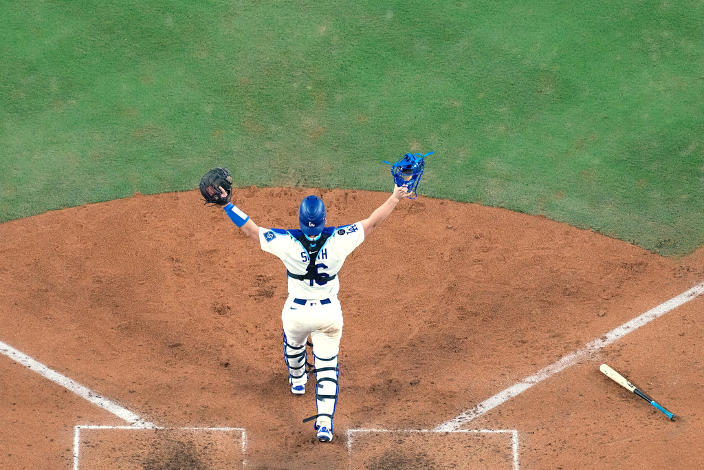 Milwaukee Brewers center fielder Blake Perkins celebrates their win against the Milwaukee Brewers in Game 4 of baseball's National League Championship Series, Friday, Oct. 17, 2025, in Los Angeles. (AP Photo/Brynn Anderson)