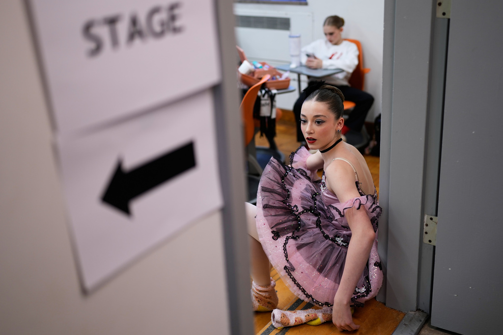 Eloise Maduri waits for Junior Classical Competition Women Age 13 during the Youth America Grand Prix (YAGP) Semi-Finals at Dominican University Performing Arts Center in River Forest, Ill., Friday, Feb. 6, 2026. (AP Photo/Nam Y. Huh)