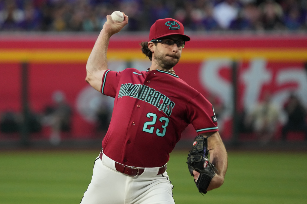 Arizona Diamondbacks pitcher Zac Gallen throws against the Colorado Rockies in the first inning of a baseball game, Saturday, May 23, 2026, in Phoenix. (AP Photo/Rick Scuteri)