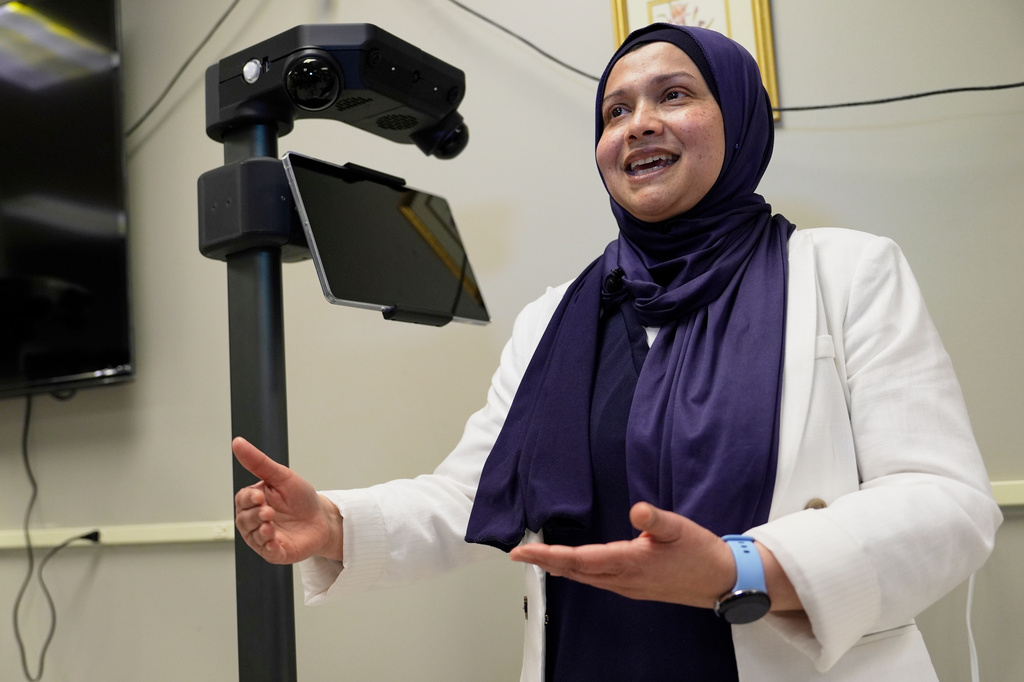 Momotaz Begum, a professor of computer sciences, speaks about the robotics program at the University of New Hampshire, Tuesday, April 21, 2026, in Durham, N.H. (AP Photo/Robert F. Bukaty)