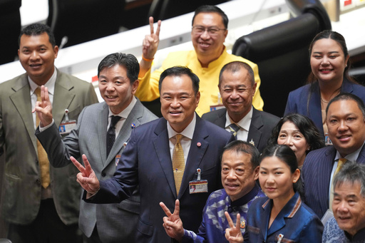 Thailand's Prime Minister Anutin Charnvirakul, center, reacts with lawmakers before he presents the policy statement at the parliament in Bangkok, Thailand, Monday, Sept. 29, 2025. (AP Photo/Sakchai Lalit) Thailand's Prime Minister Anutin Charnvirakul, center, reacts with lawmakers before he presents the policy statement at the parliament in Bangkok, Thailand, Monday, Sept. 29, 2025. (AP Photo/Sakchai Lalit)
