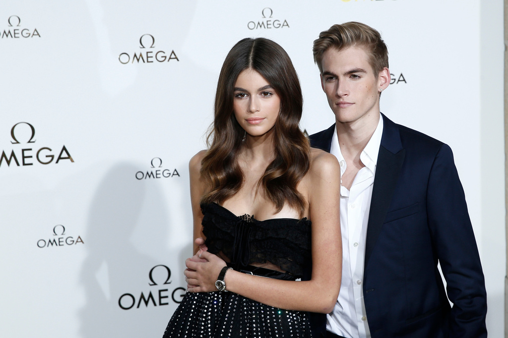 FILE - Model Kaia Gerber, left, and her brother Presley Gerber pose in Paris, Sept. 29, 2017. (AP Photo/Kamil Zihnioglu, File)