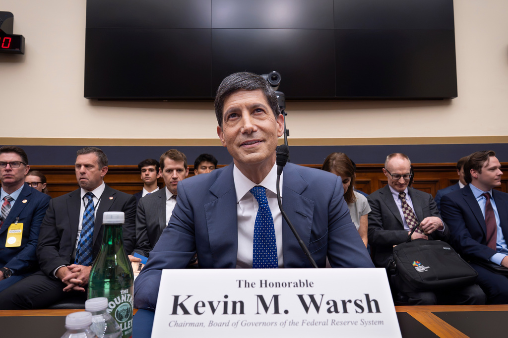 Federal Reserve Chairman Kevin Warsh appears before the House Financial Services Committee to deliver the semi-annual monetary policy report on the central bank, at the Capitol in Washington, Tuesday, July 14, 2026. (AP Photo/J. Scott Applewhite)