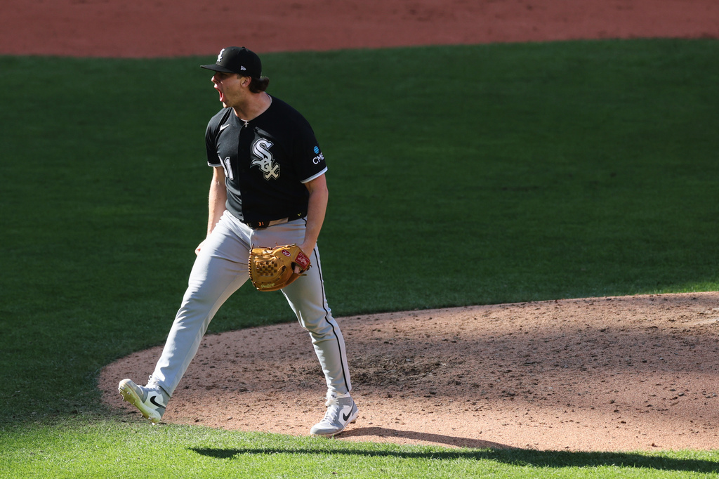 Chicago White Sox relief pitcher Grant Taylor reacts to a win over the Cleveland Guardians in Game 1 of baseball's American League Division Series, Saturday, Oct. 3, 2026, in Cleveland. (AP Photo/Tim Phillis)