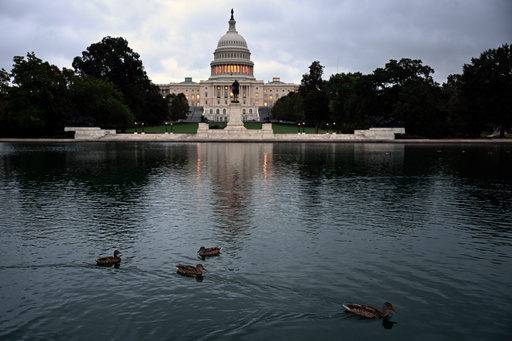 Ducks swim at daybreak in the U.S. Capitol Reflecting Pool during the 8th day of the government shutdown on Wednesday, Oct. 8, 2025, in Washington. (AP Photo/John McDonnell) Ducks swim at daybreak in the U.S. Capitol Reflecting Pool during the 8th day of the government shutdown on Wednesday, Oct. 8, 2025, in Washington. (AP Photo/John McDonnell)