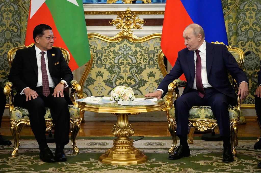 Russian President Vladimir Putin, left, and Myanmar President Min Aung Hlaing talk during their meeting at the Grand Kremlin Palace, in Moscow, Tuesday, Aug. 18, 2026. (AP Photo/Alexander Zemlianichenko, Pool)