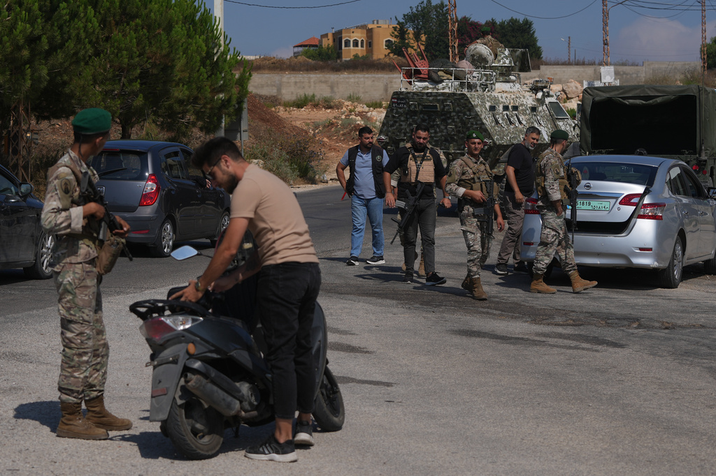 Lebanese soldiers search vehicles at a checkpoint at the entrance to Srifa village in southern Lebanon, Tuesday, July 21, 2026. (AP Photo/Hassan Ammar)