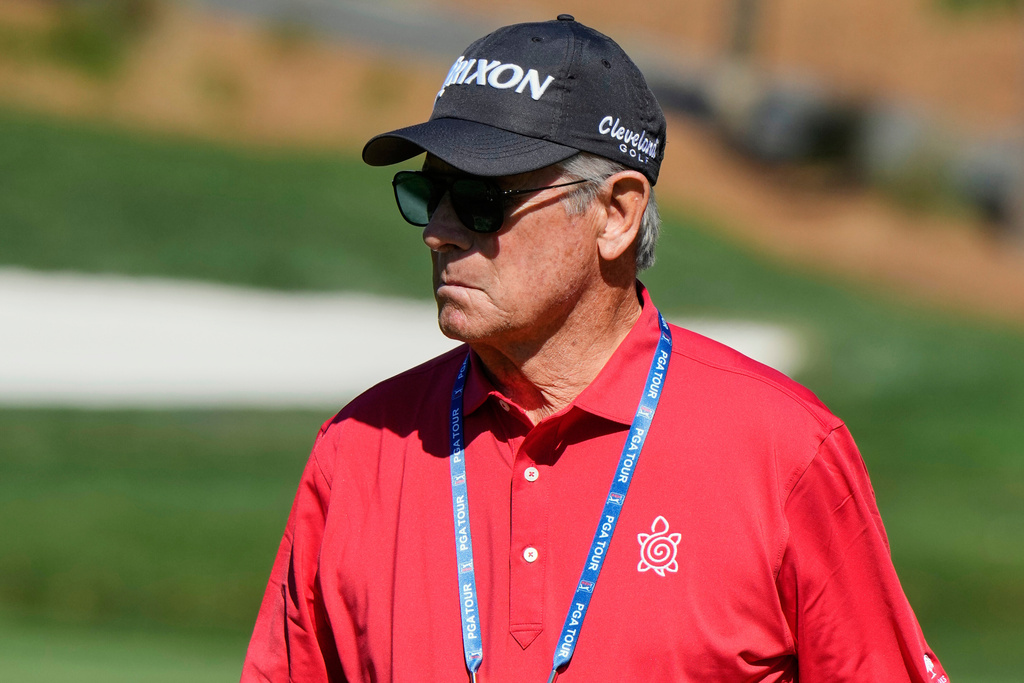 FILE - Randy Smith watches Scottie Scheffler during a practice round at The Players Championship golf tournament, March 12, 2025, in Ponte Vedra Beach, Fla. (AP Photo/Chris O'Meara, File)