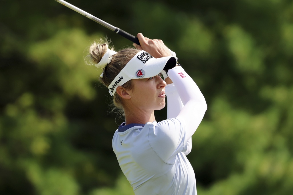 Nelly Korda hits from the third tee during the first round of the FM Championship LPGA golf tournament at TPC Boston, Thursday, Aug. 28, 2025, in Norton, Mass. (AP Photo/Michael Dwyer)