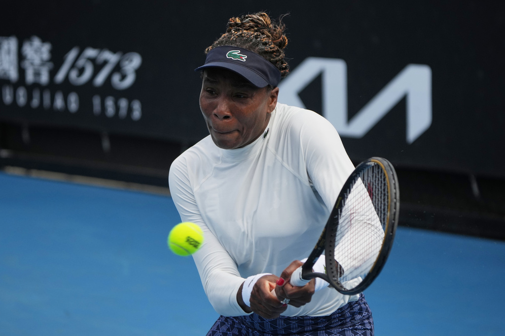 Venus Williams of the United States plays a backhand return during a practice session ahead of the Australian Open tennis championship in Melbourne, Australia, Friday, Jan. 16, 2026. (AP Photo/Dita Alangkara)