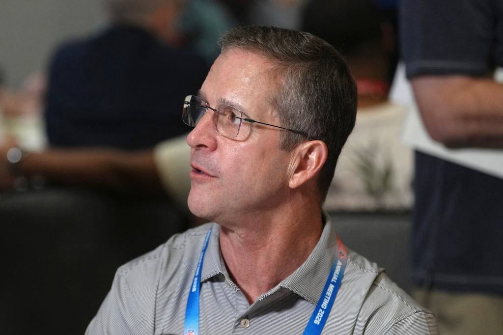 New York Giants head coach John Harbaugh talks with reporters at the annual NFL football meetings, Monday, March 30, 2026, in Phoenix. (AP Photo/Ross D. Franklin)