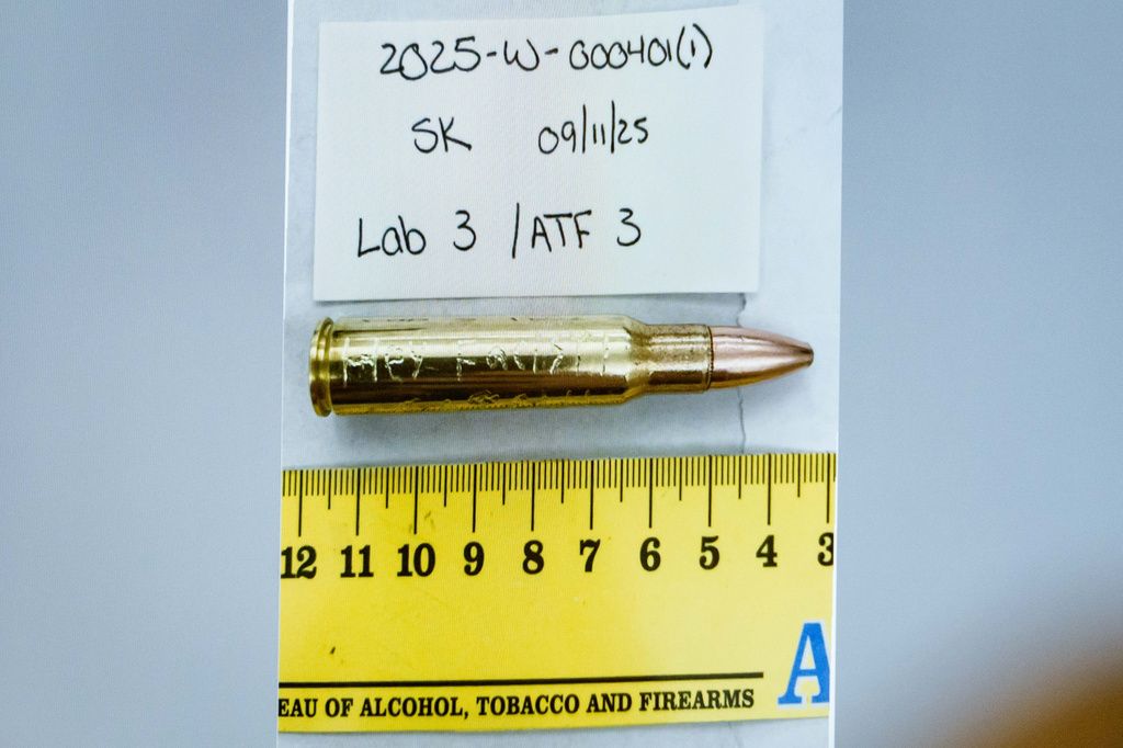 FILE - An image of a bullet casing engraved with the words, "Hey Fascist!" is displayed during a preliminary hearing for Tyler Robinson, who is accused in the fatal shooting of Charlie Kirk, at the Fourth District Courthouse in Provo, Utah, July 9, 2026. (AP Photo/Spenser Heaps, Pool, File)