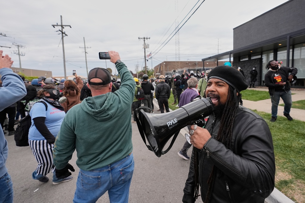 Protesters gather outside an ICE processing facility in the Chicago suburb of Broadview, Ill., Saturday, Nov. 1, 2025. (AP Photo/Alex Brandon)