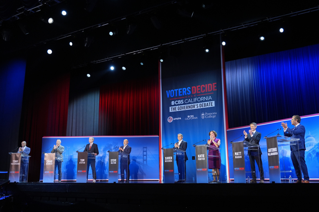 From left, Tony Thurmond, Chad Bianco, Tom Steyer, Steve Hilton, Xavier Becerra, Katie Porter, Matt Mahan and Antonio Villaraigosa participate in a gubernatorial debate hosted by CBS LA at Pomona College in Claremont, Calif., Tuesday, April 28, 2026. (AP Photo/Jae C. Hong)