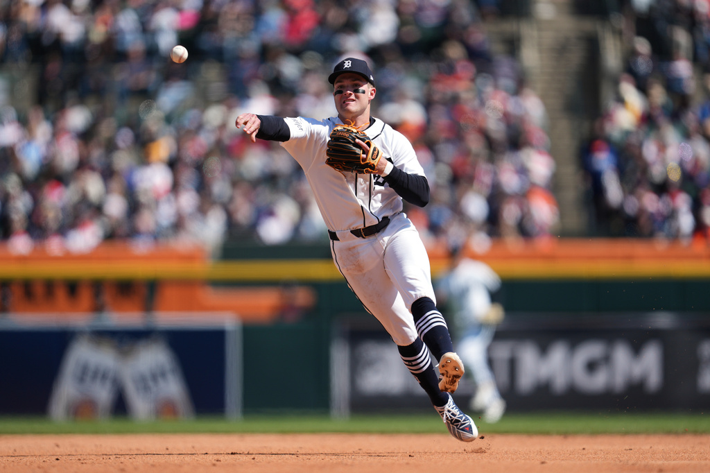 Detroit Tigers shortstop Kevin McGonigle throws to first base for an out on a Miami Marlins' Graham Pauley ground ball during the sixth inning of a baseball game Saturday, April 11, 2026, in Detroit. (AP Photo/Paul Sancya)
